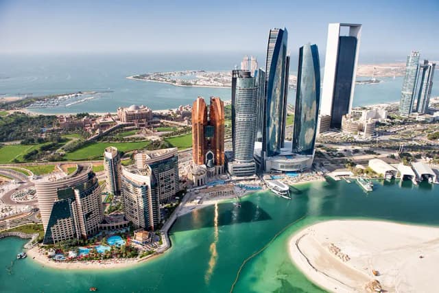 Abu Dhabi tourism showcasing Sheikh Zayed Grand Mosque, modern skyline, desert safari, cultural museums, and luxury landmarks