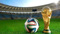 Iconic FIFA World Cup 2026 trophy against a football scene symbolising global travel and excitement