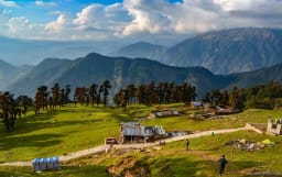 Panoramic view of Chopta meadows and Himalayan peaks in Uttarakhand