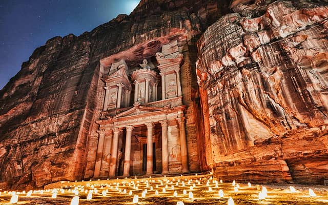 Jordan tourism showcasing Petra Treasury, Wadi Rum desert, Dead Sea floating, Roman ruins, and historic landscapes