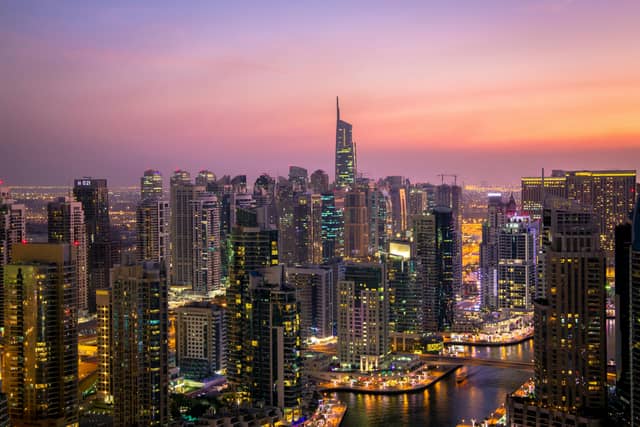 Dubai tourism showcasing Burj Khalifa skyline, Palm Jumeirah, desert safari dunes, luxury landmarks, and modern city life