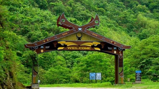 Nagaland tourism showcasing Hornbill Festival, Dzukou Valley, Kohima War Cemetery, tribal villages, and scenic hills