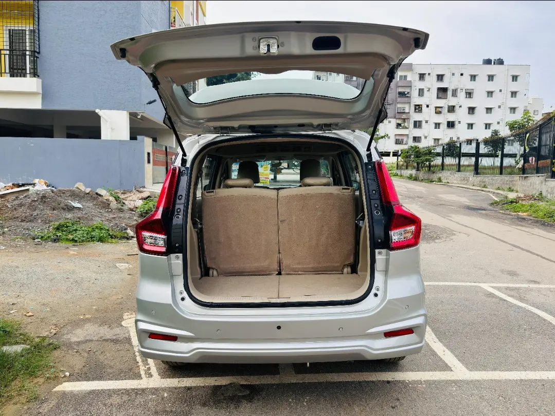 Maruti Ertiga rear back side view showing spacious 7 seater MPV with luggage space