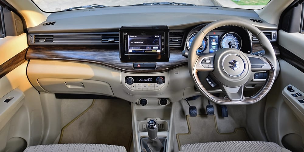 Maruti Ertiga interior cabin view with 7 seater comfortable seating and air-conditioned family car