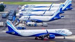IndiGo Airlines planes parked at an airport apron amid international flight cancellations